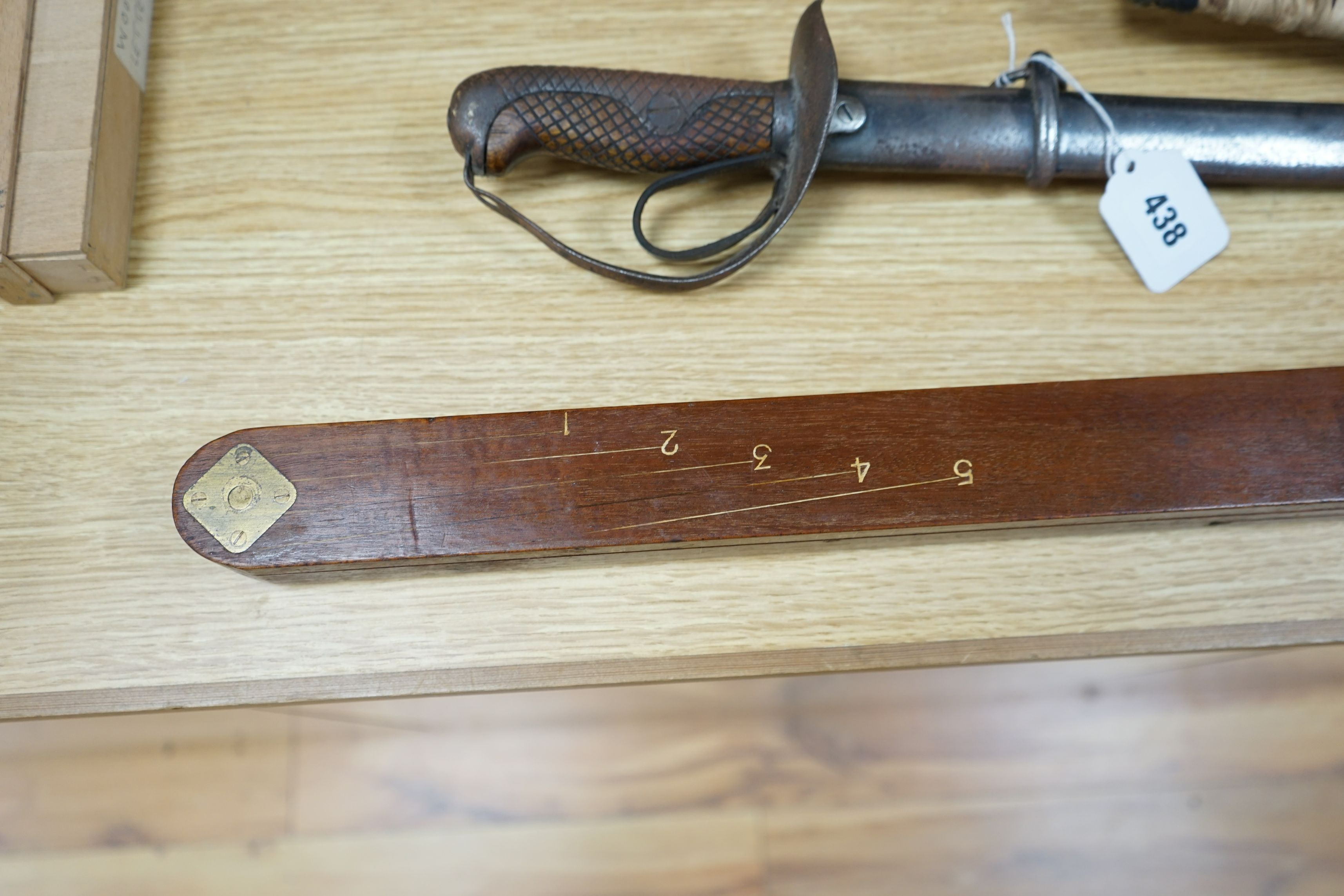 A brass mounted mahogany measure, 126cms long